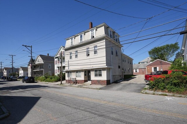 79-81 N Main St, Webster, MA 01570 - view of front of property with a residential view and a chimney