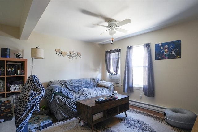 79-81 N Main St, Webster, MA 01570 - living area with a baseboard heating unit, ceiling fan, and wood finished floors