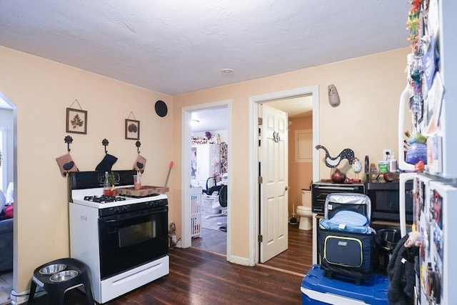 79-81 N Main St, Webster, MA 01570 - kitchen featuring range with gas stovetop and dark wood-type flooring