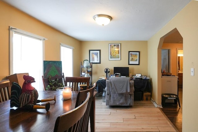 79-81 N Main St, Webster, MA 01570 - dining room with light wood-style floors and arched walkways