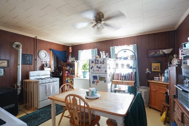 79-81 N Main St, Webster, MA 01570 - dining room featuring ornamental molding, a ceiling fan, and wood walls