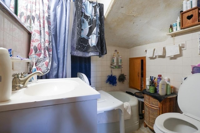 79-81 N Main St, Webster, MA 01570 - bathroom featuring tile walls, a garden tub, and vanity