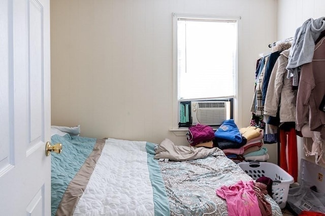 bedroom featuring cooling unit