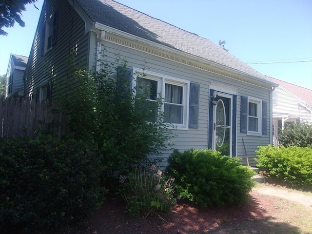 14 Mutton Ln, Weymouth, MA 02189 - view of front of house featuring roof with shingles