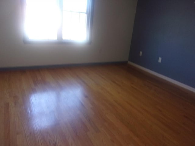 14 Mutton Ln, Weymouth, MA 02189 - empty room with baseboards and wood finished floors