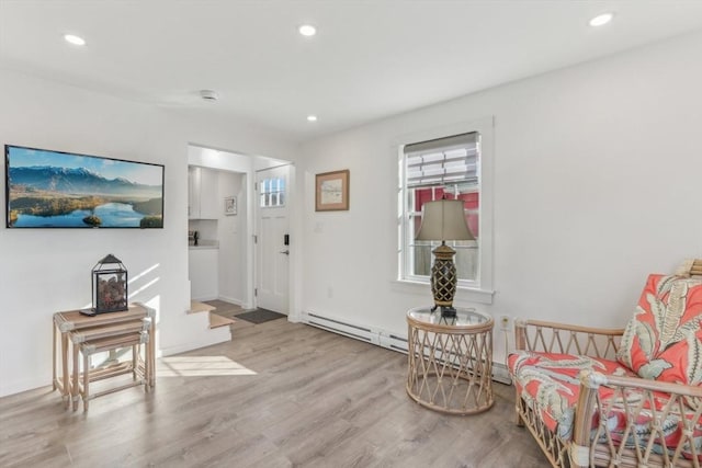 sitting room with light wood-type flooring