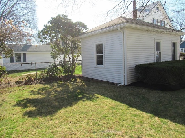 view of outdoor structure with fence