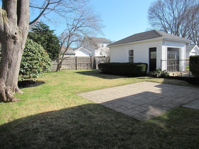 view of yard featuring a patio area and fence