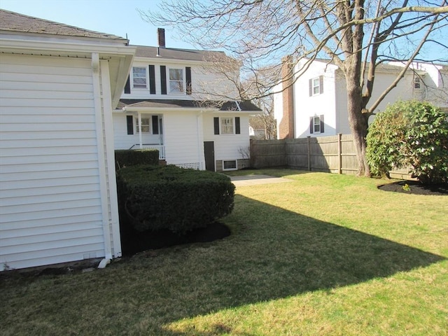 view of yard with fence