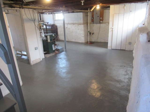basement featuring electric panel