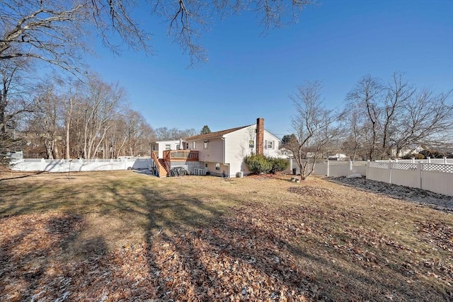 view of yard with a wooden deck