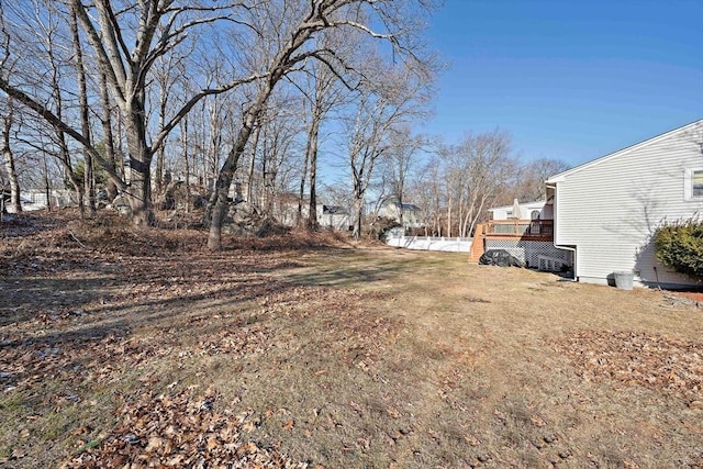 view of yard featuring a wooden deck