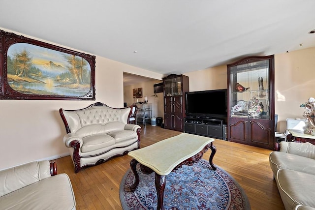 living room with light hardwood / wood-style flooring