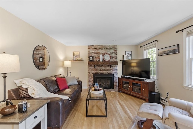 40 Abbott Ln, Chelmsford, MA 01824 - living room with light wood-style flooring and a fireplace