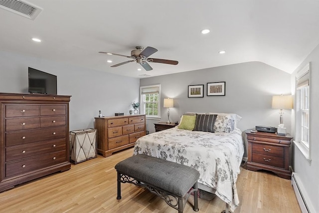 40 Abbott Ln, Chelmsford, MA 01824 - bedroom featuring a baseboard heating unit, light wood finished floors, recessed lighting, a ceiling fan, and vaulted ceiling