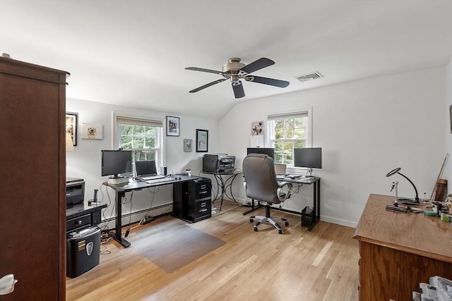 40 Abbott Ln, Chelmsford, MA 01824 - home office featuring a baseboard radiator, a ceiling fan, plenty of natural light, light wood-type flooring, and vaulted ceiling