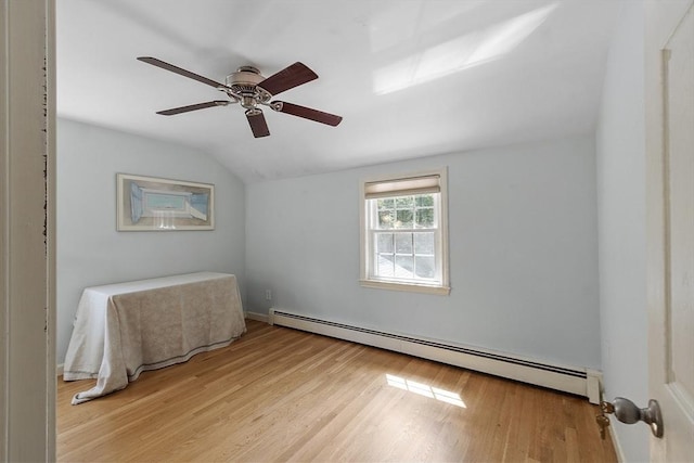 40 Abbott Ln, Chelmsford, MA 01824 - unfurnished bedroom with baseboard heating, lofted ceiling, light wood-style flooring, and ceiling fan