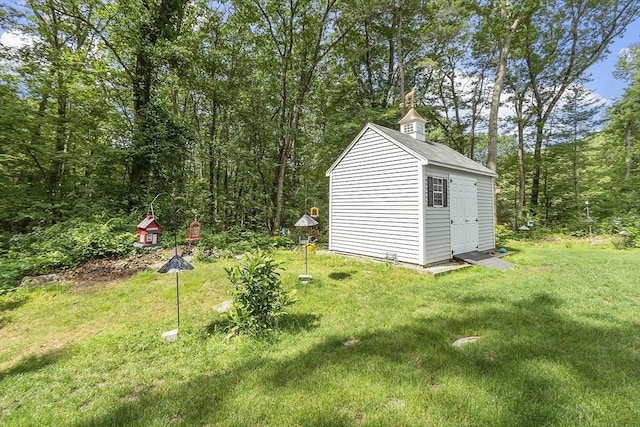 40 Abbott Ln, Chelmsford, MA 01824 - view of shed with a view of trees