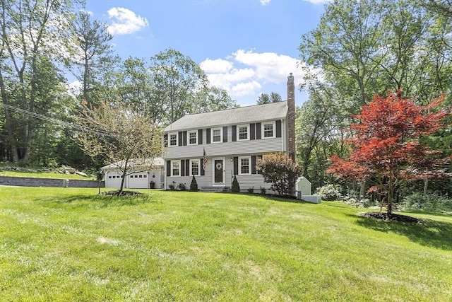 40 Abbott Ln, Chelmsford, MA 01824 - colonial house with a chimney, a front lawn, and entry steps