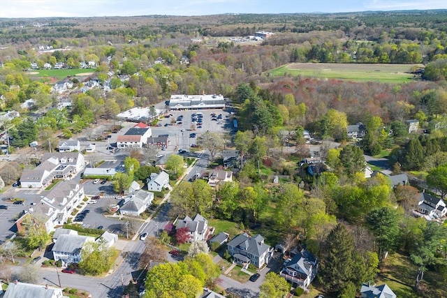 aerial view with a forest view and a residential view