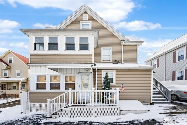 view of snow covered property