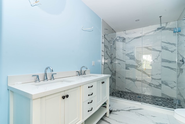 bathroom with double sink vanity, a shower with door, tile patterned flooring, and toilet