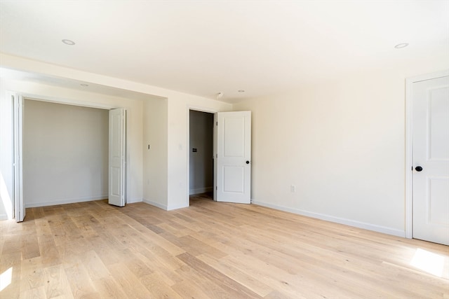 unfurnished bedroom with light hardwood / wood-style flooring