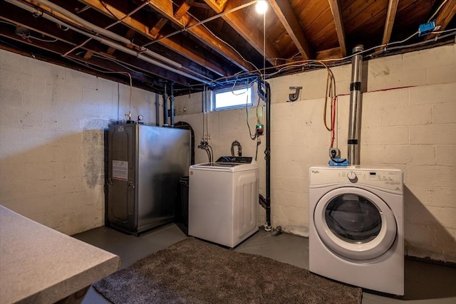 laundry room with washer and dryer and laundry area