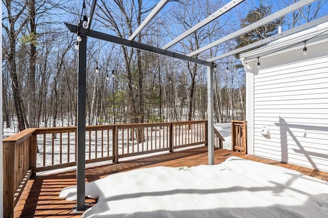 view of snow covered deck