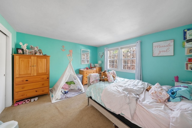 bedroom featuring carpet flooring