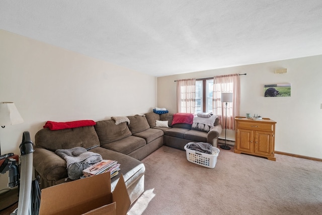 living room featuring carpet flooring, a textured ceiling, and baseboard heating