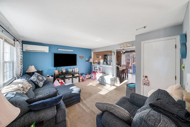 living room with carpet flooring, a wall mounted AC, and ceiling fan