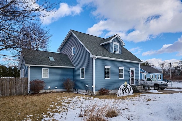 view of snow covered property