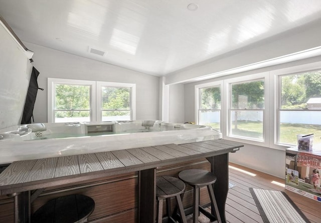 30 Pheasant Ln, Pembroke, MA 02359 - kitchen with healthy amount of natural light, vaulted ceiling, and hardwood / wood-style floors