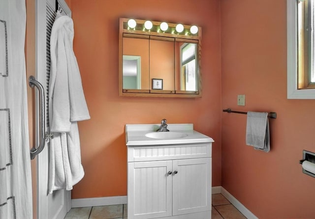 30 Pheasant Ln, Pembroke, MA 02359 - bathroom with vanity, baseboards, and tile patterned floors