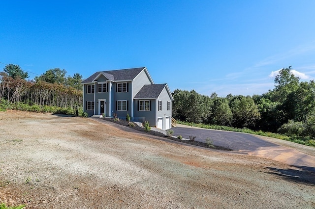 view of front of house with a garage