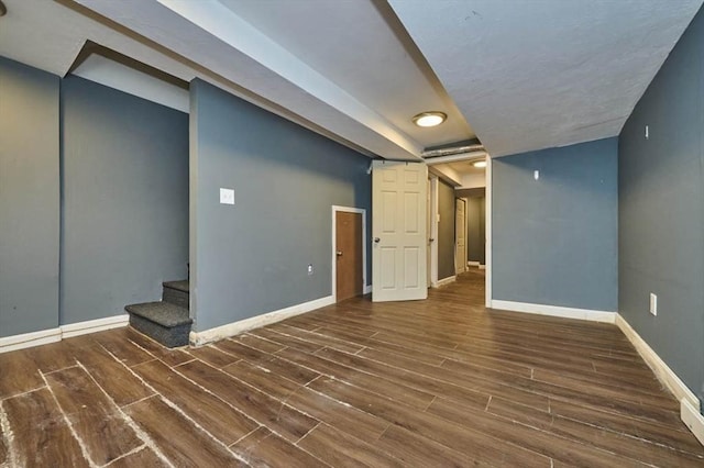 114 Mount Ida Rd Unit A, Boston, MA 02122 - finished below grade area featuring wood finished floors, baseboards, and stairway