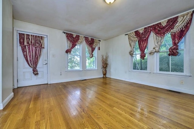 114 Mount Ida Rd Unit A, Boston, MA 02122 - foyer with light wood-type flooring and baseboards