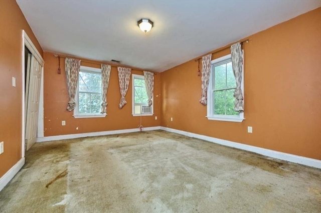 114 Mount Ida Rd Unit A, Boston, MA 02122 - carpeted spare room featuring baseboards and plenty of natural light