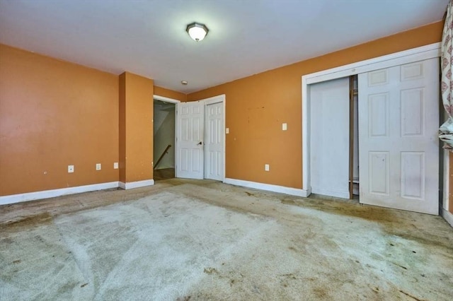 114 Mount Ida Rd Unit A, Boston, MA 02122 - unfurnished bedroom featuring multiple closets, carpet flooring, and baseboards