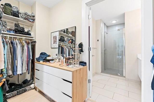 121 Portland St Unit Ph3, Boston, MA 02114 - walk in closet featuring light tile patterned floors