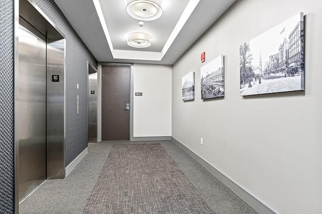121 Portland St Unit Ph3, Boston, MA 02114 - corridor featuring elevator, carpet flooring, and a raised ceiling