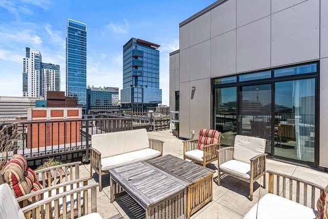 121 Portland St Unit Ph3, Boston, MA 02114 - view of patio with outdoor lounge area and a view of city