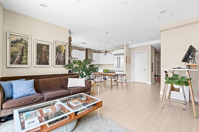 121 Portland St Unit Ph3, Boston, MA 02114 - living room featuring light wood-style floors and baseboards