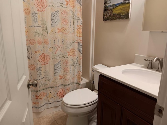 bathroom featuring toilet, tile patterned floors, shower / bath combo with shower curtain, and vanity