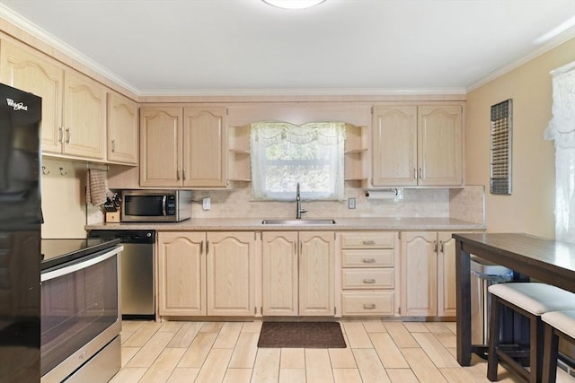 kitchen featuring backsplash, open shelves, a sink, light brown cabinets, and stainless steel appliances