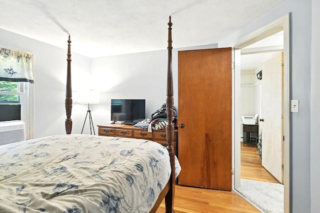 bedroom featuring light wood-type flooring