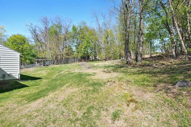 view of yard with fence