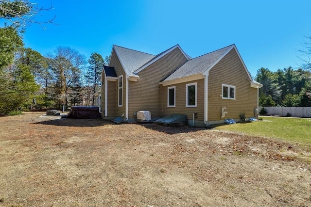 26 Crosswinds Way, Falmouth, MA 02536 - view of side of home featuring fence and a yard