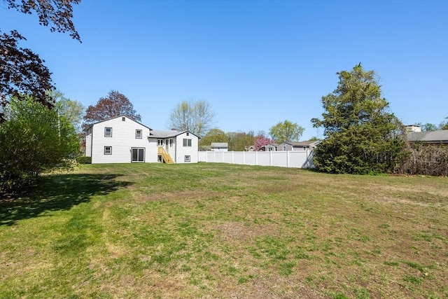 view of yard with fence